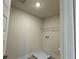Small closet with a drain pan and wiring for a washer and dryer at 4113 Sagefield Dr, Harmony, FL 34773