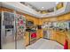 Functional kitchen with stainless steel appliances, granite countertops, and ample storage at 4738 St Andrews Arc, Leesburg, FL 34748