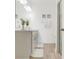 Bright bathroom with a sleek vanity and glass-enclosed shower at 5724 Camilla St, St Cloud, FL 34771