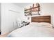 Bedroom with decor shelving and a full size bed at 5724 Camilla St, St Cloud, FL 34771