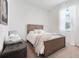 Cozy bedroom with soft lighting and comfortable furnishings create a relaxing retreat at 5724 Camilla St, St Cloud, FL 34771