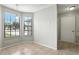 Bright dining area with tile flooring and view to the neighborhood at 7810 Wortham Ct, Orlando, FL 32825