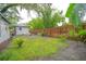 Expansive backyard featuring a well-maintained lawn and a privacy fence, perfect for outdoor enjoyment at 805 E 20Th St, Sanford, FL 32771