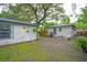 Spacious backyard with a detached building, offering ample space for recreation and storage at 805 E 20Th St, Sanford, FL 32771