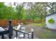 Backyard with mature trees, a spacious yard, and outdoor seating at 805 E 20Th St, Sanford, FL 32771