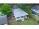 Charming home exterior with a well-maintained yard, American flag, and welcoming front porch at 805 E 20Th St, Sanford, FL 32771