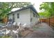 Side exterior view of the home highlighting the patio area, adjacent to the fence at 805 E 20Th St, Sanford, FL 32771