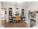 Bright office with wood floors, built-in bookcases, and natural light at 805 E 20Th St, Sanford, FL 32771