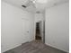 Bright bedroom with ceiling fan, neutral carpet, and two closets with doors at 12524 Aldershot Ln, Windermere, FL 34786