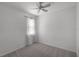 Bedroom featuring neutral walls, carpet, and a window with curtains at 12524 Aldershot Ln, Windermere, FL 34786