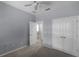 Bedroom featuring neutral colors, carpet, and an open doorway to an adjoining room at 12524 Aldershot Ln, Windermere, FL 34786