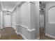 Elegant hallway with wood flooring leads to the front door at 12524 Aldershot Ln, Windermere, FL 34786