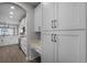 A modern kitchen with stainless appliances and custom cabinets at 12524 Aldershot Ln, Windermere, FL 34786