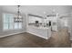 Open kitchen featuring granite countertops and stainless steel appliances at 12524 Aldershot Ln, Windermere, FL 34786