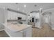 Well-equipped kitchen with stone countertops and stainless steel appliances at 12524 Aldershot Ln, Windermere, FL 34786