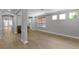 Spacious living room with an abundance of natural light and hardwood flooring at 12524 Aldershot Ln, Windermere, FL 34786