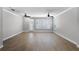 Spacious living room with plantation shutters and modern ceiling fans for comfort at 12524 Aldershot Ln, Windermere, FL 34786