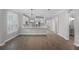 Bright living area with hardwood floors, open floor plan, and plenty of natural light at 12524 Aldershot Ln, Windermere, FL 34786