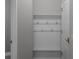 Mud room with a coat rack and bench, providing a convenient storage solution at 12524 Aldershot Ln, Windermere, FL 34786