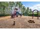 Community playground featuring a variety of play structures and a wood chip safety surface at 12524 Aldershot Ln, Windermere, FL 34786