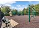 Community playground with slides, swings, and climbing structures on a wood chip ground at 12524 Aldershot Ln, Windermere, FL 34786
