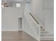 Staircase with carpeted steps and white banister leading to the second floor at 2262 Stonehedge Loop, Kissimmee, FL 34743