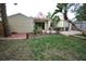 Private backyard featuring a patio, garden and lawn at 230 E Esther St, Orlando, FL 32806