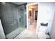 Modern bathroom featuring tiled shower and dual sinks at 230 E Esther St, Orlando, FL 32806