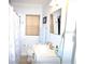 Bright bathroom with a bathtub and modern sink at 230 E Esther St, Orlando, FL 32806