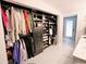 Spacious walk-in closet with custom shelving and ample storage for clothing and accessories at 230 E Esther St, Orlando, FL 32806