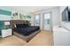 Inviting bedroom featuring a queen bed with lamps on the nightstands and a painted accent wall at 2613 Calistoga Ave, Kissimmee, FL 34741