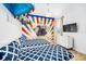 Themed ' bedroom with two beds, an elephant mural, and blue and white patterned bedding at 2613 Calistoga Ave, Kissimmee, FL 34741