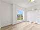 View of the bedroom featuring a window and closet at 7500 Toscana Blvd # 331, Orlando, FL 32819