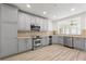 Bright kitchen with stainless steel appliances and updated finishes at 7500 Toscana Blvd # 331, Orlando, FL 32819