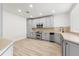 Bright kitchen with stainless steel appliances and updated finishes at 7500 Toscana Blvd # 331, Orlando, FL 32819
