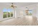 Bright living room with many windows and an outdoor patio at 7500 Toscana Blvd # 331, Orlando, FL 32819