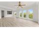 Living room featuring lots of light and a view of the kitchen at 7500 Toscana Blvd # 331, Orlando, FL 32819