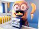 Fun room featuring a unique Minion mural, bunk beds, and a colorful dresser at 7858 Spectrum Dr, Reunion, FL 34747