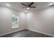 Bright bedroom with a ceiling fan and hardwood floors at 18813 Mosby St, Orlando, FL 32833