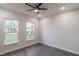 Comfortable bedroom featuring hardwood floors and natural lighting at 18813 Mosby St, Orlando, FL 32833