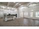 Bright, open-concept kitchen featuring a large island, stainless steel appliances, and modern finishes at 18813 Mosby St, Orlando, FL 32833