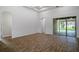 Open-concept living and dining area with wood flooring and natural light at 18813 Mosby St, Orlando, FL 32833