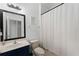This bathroom features a single sink vanity, toilet, and a tub and shower combo at 3643 Weatherfield Dr, Kissimmee, FL 34746