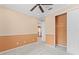 Cozy carpeted bedroom with a closet and neutral paint, providing a tranquil retreat at 1011 Wood Cv, Kissimmee, FL 34743