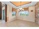 Elegant dining room with a chandelier and natural light at 1011 Wood Cv, Kissimmee, FL 34743