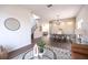 Open-concept living room offering versatile space for living and dining, enhanced by natural light at 14217 Sapphire Bay Cir, Orlando, FL 32828