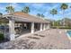 Covered poolside lounge with comfortable seating and shaded areas, perfect for relaxation at 14217 Sapphire Bay Cir, Orlando, FL 32828