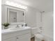 Clean, well-lit bathroom with a tub-shower combo, white vanity, and neutral finishes at 200 St Andrews Blvd # 802, Winter Park, FL 32792