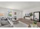 Inviting living space offering natural light, stylish decor, and a tranquil atmosphere at 200 St Andrews Blvd # 802, Winter Park, FL 32792
