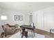Inviting home office area with plush armchair, modern desk, and neutral decor at 200 St Andrews Blvd # 802, Winter Park, FL 32792